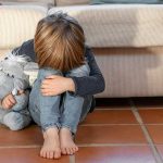 child in therapy talks of adoption wounding